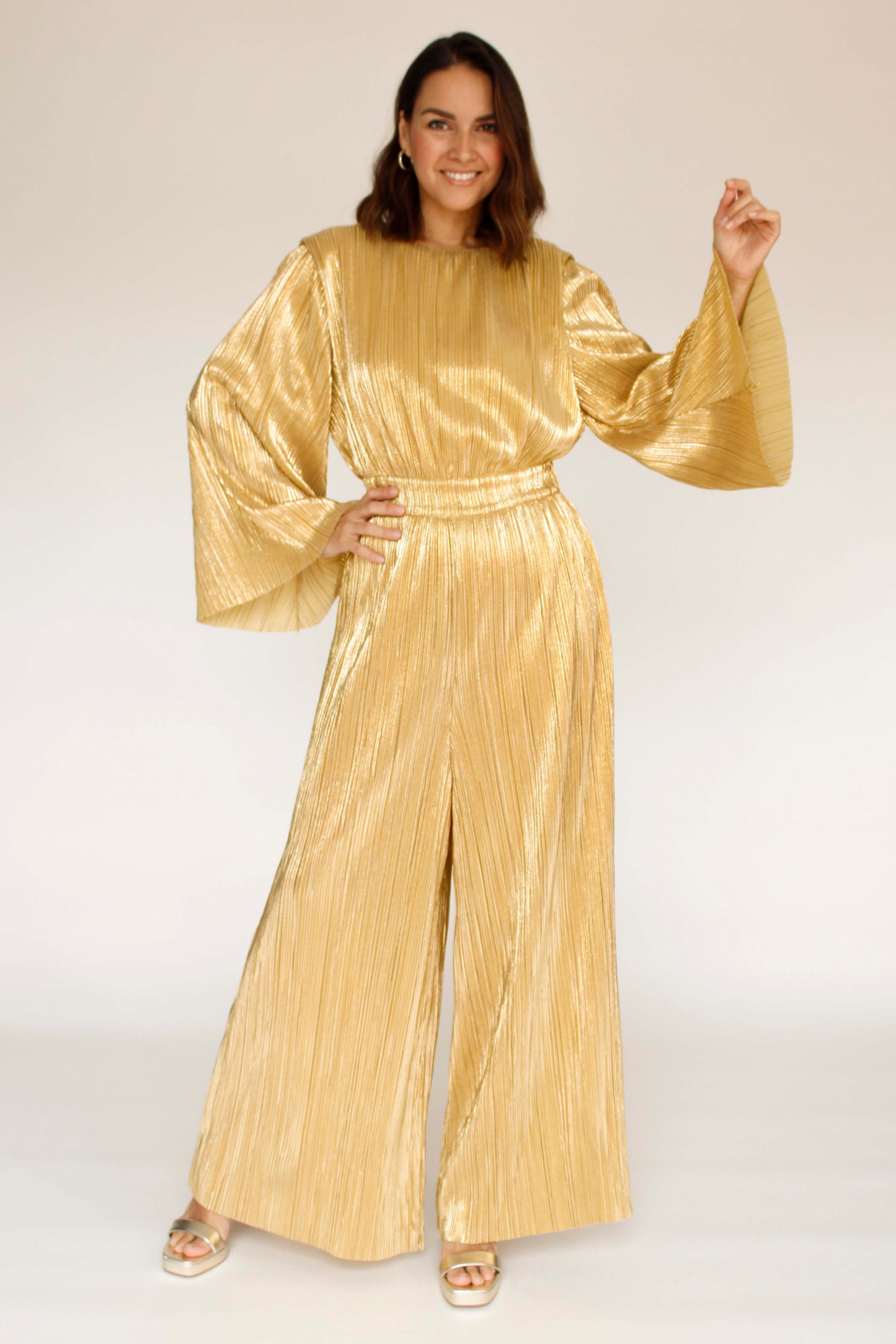 JUMPSUIT DORADO IP8055